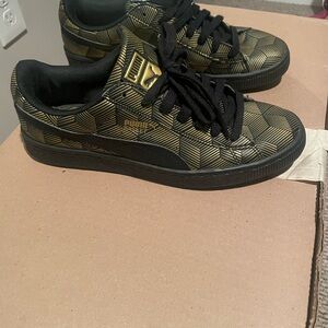 Puma Geometric Black and Gold Sneakers